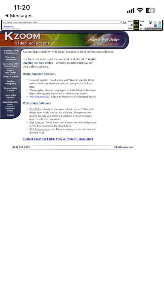 Kzoom's old website shown on a mobile device.