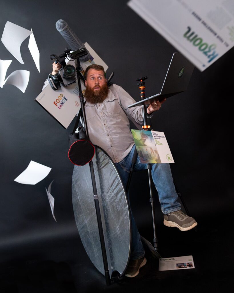 A man juggling too many objects at one time.